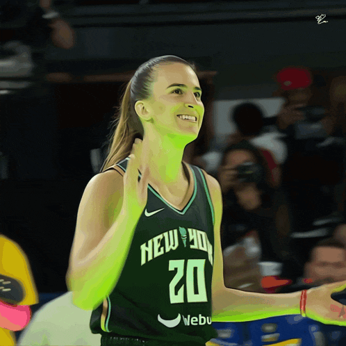 a female basketball player wearing a new york jersey