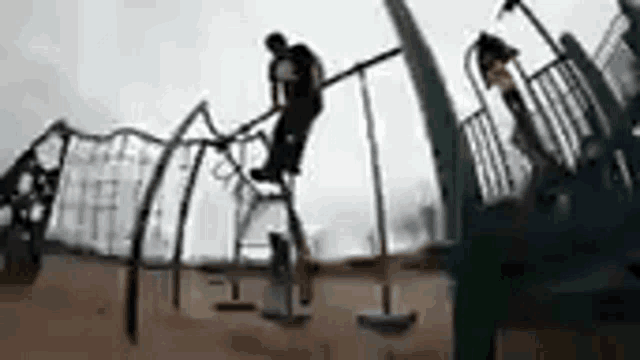 a person is riding a bicycle on a playground .