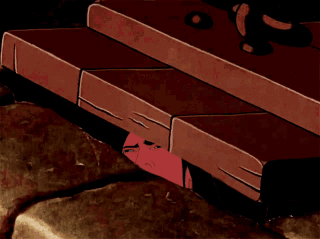 a cartoon of a man 's head sticking out of a hole in a wall