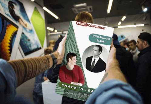 a person is holding a pamphlet that says profit concierge on it