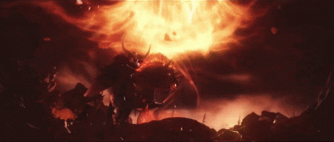 a man with horns is riding a horse in a dark landscape