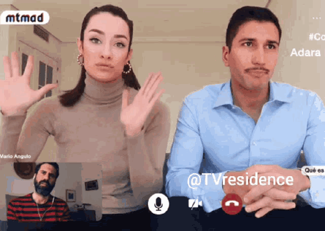 a man and a woman are on a video call with a mtmad logo