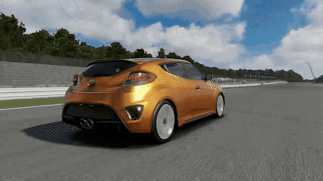 an orange hyundai car is driving on a track