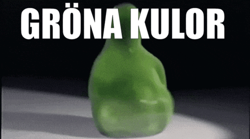 a green frog is sitting on a white surface with the words " grona kulor " in white letters