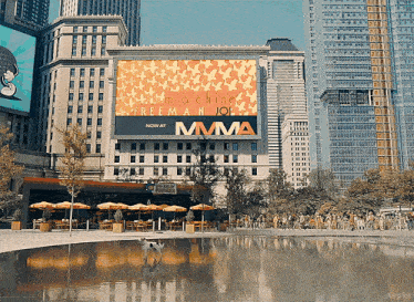 a large billboard on a building advertising mma