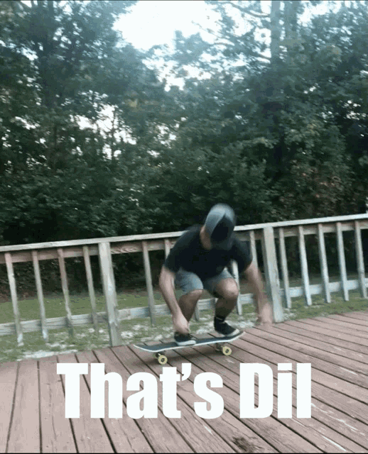 a man riding a skateboard on a wooden deck with the words that 's dil written below him