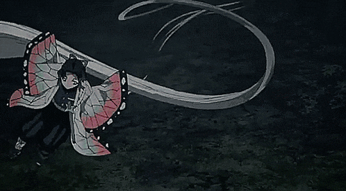 a person in a butterfly costume is flying through the air with a long tail .