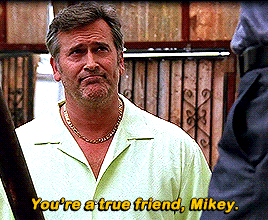 a man in a green shirt says " you 're a true friend "