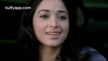 a close up of a woman 's face with the words kulfyapp.com on the bottom right corner .