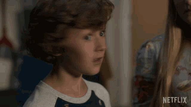 a young boy looks surprised in a netflix advertisement
