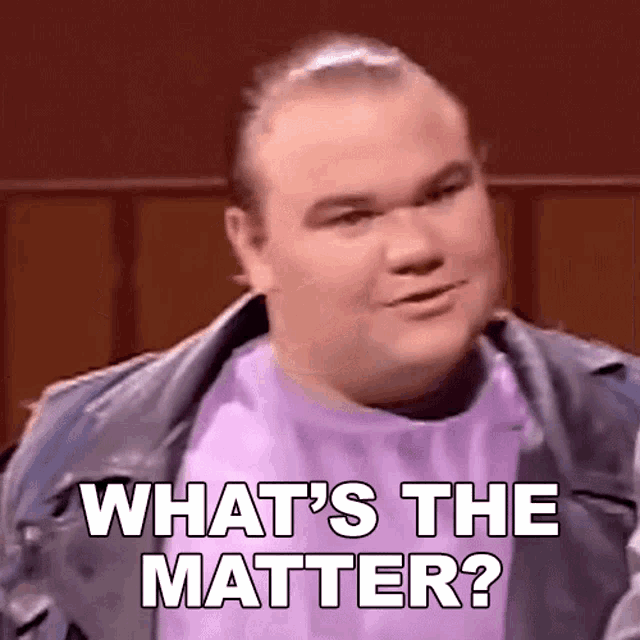 a fat man in a purple shirt is asking what 's the matter ?