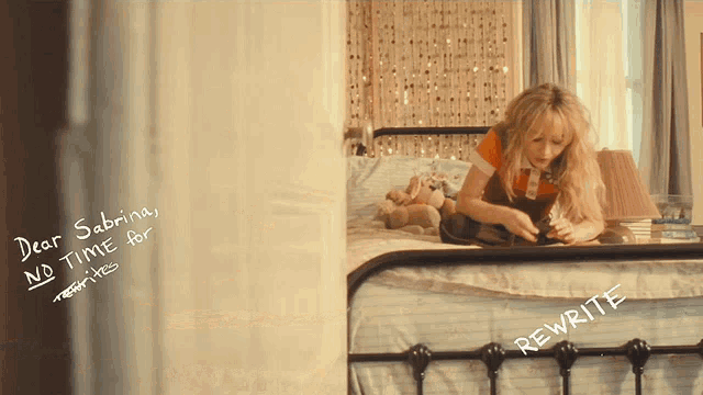 a girl laying on a bed with a note written on the wall that says dear sabrina no time for rewrites