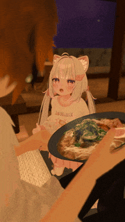 a girl with a cat ear is sitting at a table with a bowl of food
