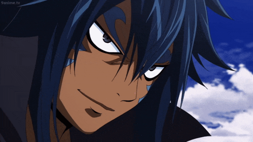 a close up of a person 's face with an anime tv logo visible