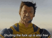 a man in a superhero costume is talking about shutting the fuck up is also free .