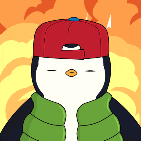 a cartoon penguin wearing a red hat and green vest