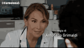 a woman in a lab coat with the name antonello grimaldi