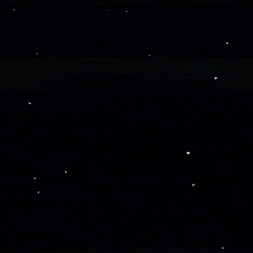a minecraft character is flying through the air in a dark room .