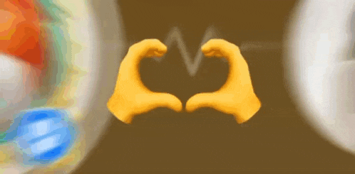 a pair of hands making a heart shape with the letter v behind them