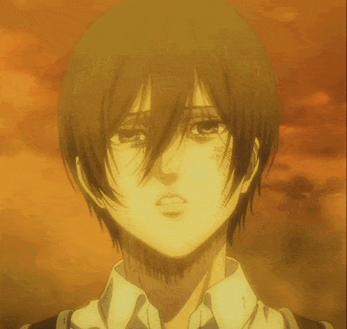 a close up of a cartoon character 's face with a red sky in the background