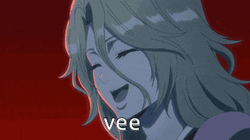 a close up of a woman 's face with the word vee in the lower right corner