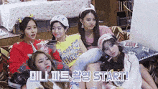 a group of girls are sitting on a couch with the words start written on the bottom of the image .