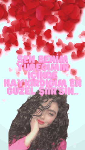 a girl with curly hair is surrounded by red hearts and the words sen benim yuregimin