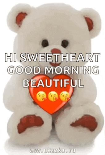 a teddy bear is holding a red heart with smiley faces on it and says his sweetheart good morning beautiful .