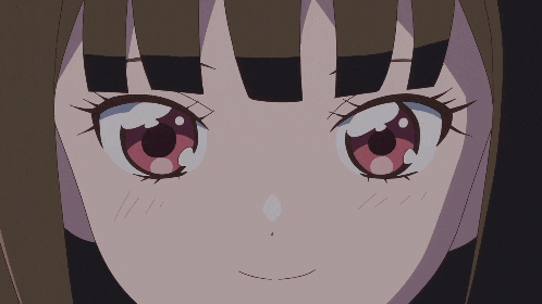 a close up of a girl 's face with a diamond in her nose
