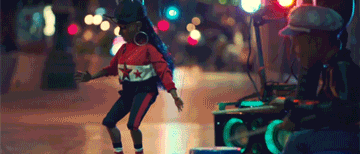 a girl in a red white and blue outfit with a star on it