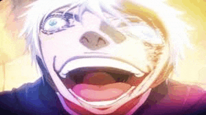 a close up of a person 's face with their mouth open and eyes closed .