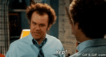 a man in a blue shirt and tie says yep in front of another man