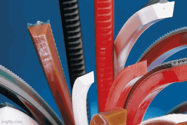 a bunch of different types of belts are on a table