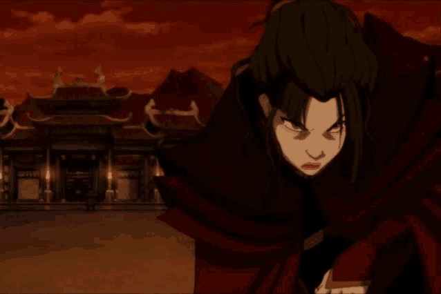 a woman in a red cape is standing in front of a temple