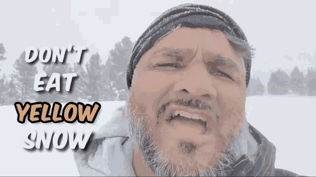 a man with a beard is making a funny face with the words " do n't eat yellow snow " behind him