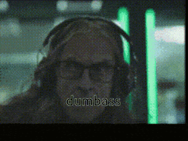 a pixelated image of a person wearing headphones with the word dumbass written below them