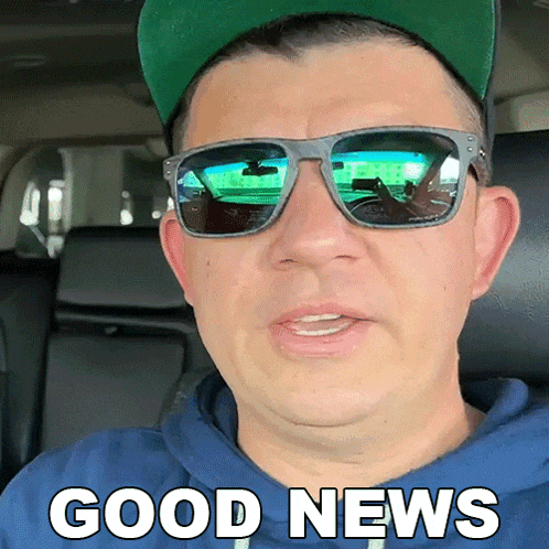 a man wearing sunglasses and a hat has the words good news written on his face