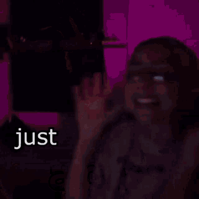 a woman with glasses is making a peace sign and says " just leave me alone "