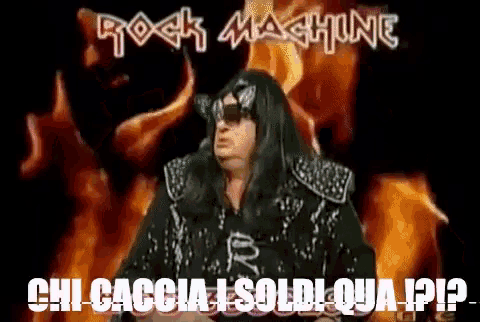 a man with long hair and sunglasses is standing in front of a fire and the words rock machine