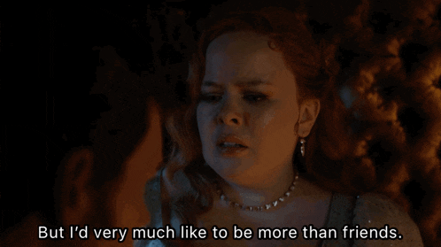 a woman says " but i 'd very much like to be more than friends " in a dark room