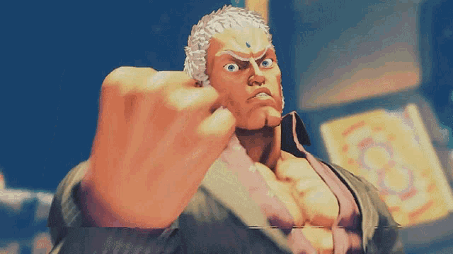 a man with a tattoo on his forehead is making a fist