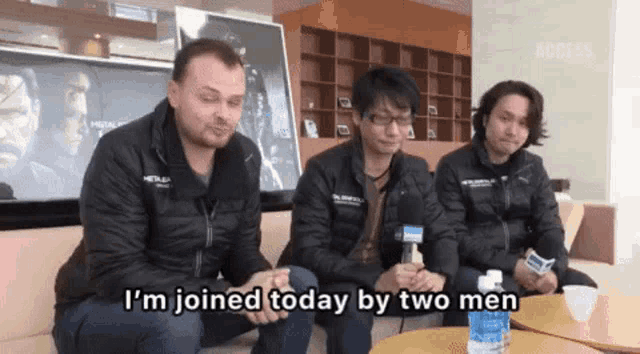 three men are sitting on a couch with one saying i 'm joined today by two men