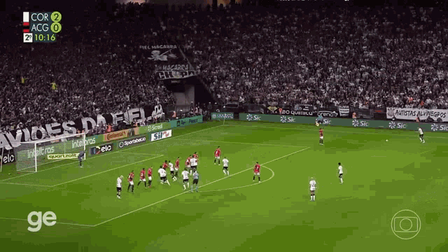 a soccer game is being played in a stadium with ads for continental and sip