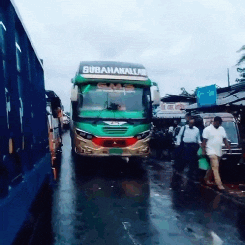a green bus with the word subahanallah on the side