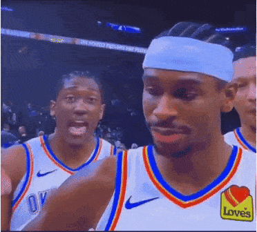 a basketball player with a headband that says loves