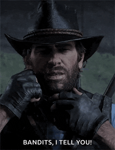 a man wearing a cowboy hat and gloves says " bandits i tell you "