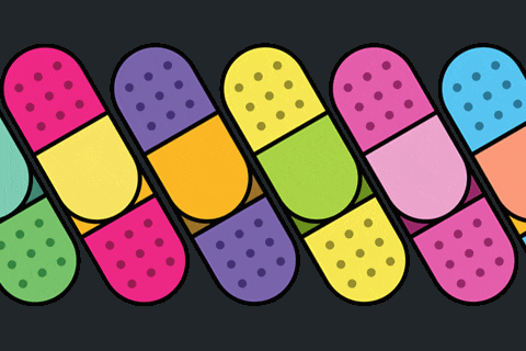 a row of colorful bandages with polka dots on a black background