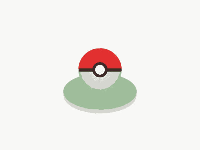 a red white and black ball with a black circle in the center