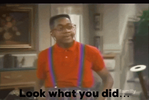 a man in a red shirt and suspenders says look what you did ..
