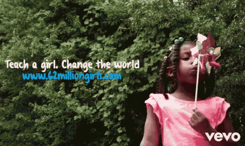 a little girl holding a windmill with the words teach a girl change the world on the bottom